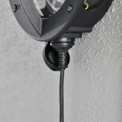 Oden vegglampe utendørs IP23 m/stikkontakt - Svart/klart glass